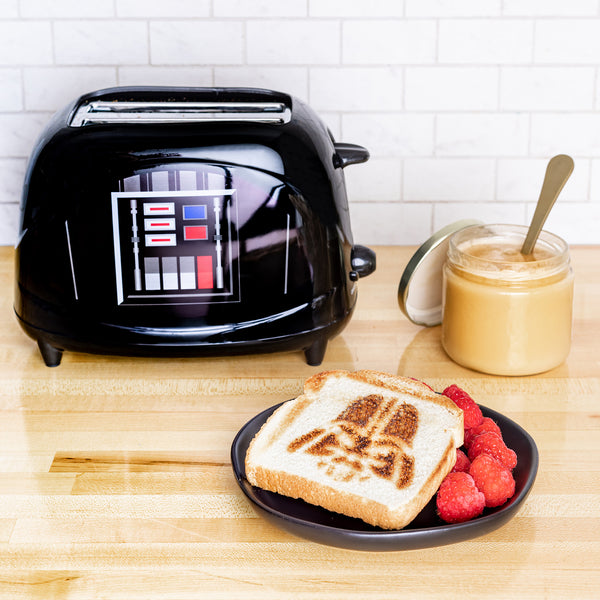 Uncanny Brands Star Wars Darth Vader Halo Toaster Lights Up w