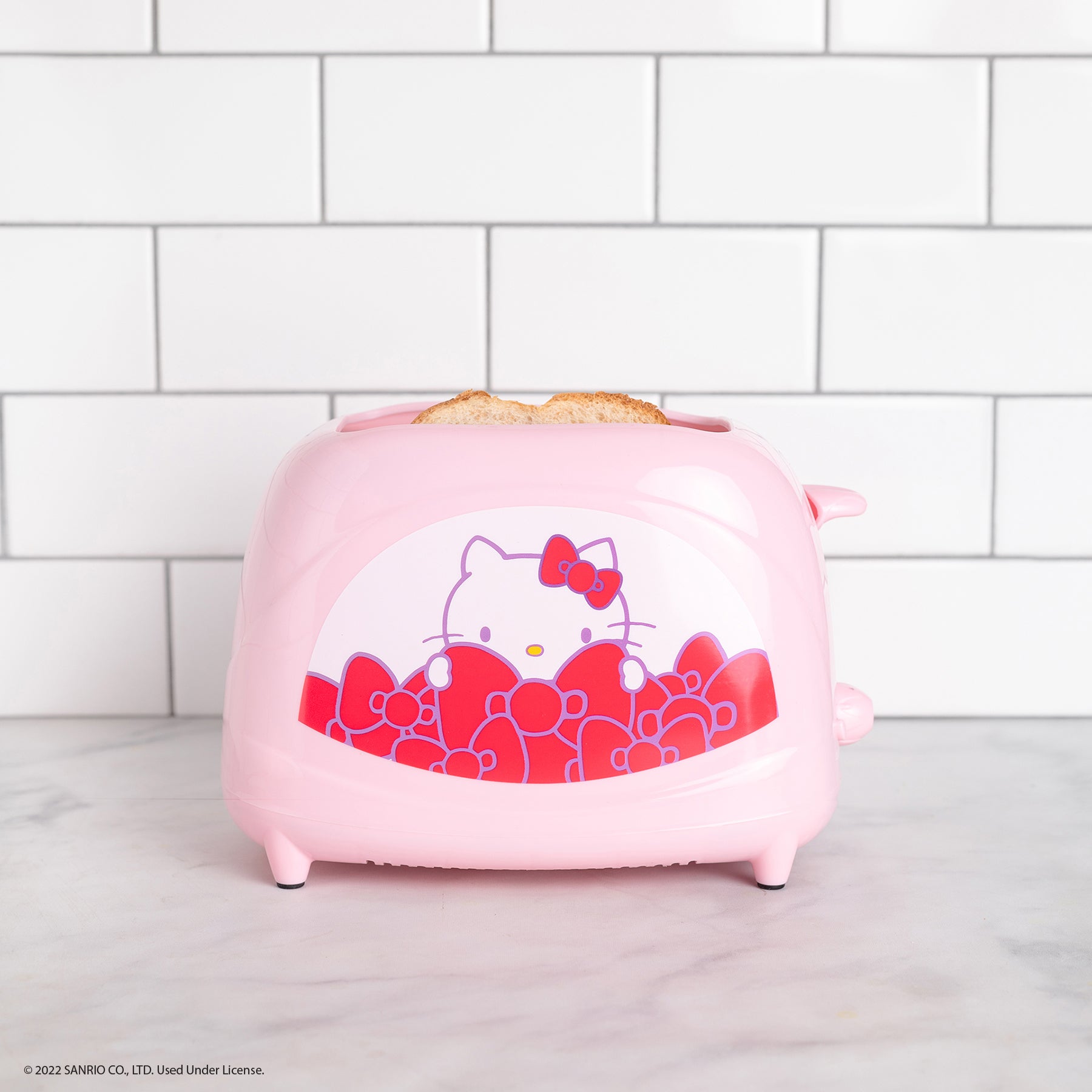 Uncanny Brands Pink Hello Kitty Mini American Waffle Maker WM3-KIT