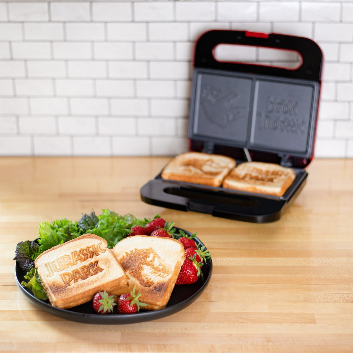 Uncanny Brands Jurassic Park Waffle Maker | Small Kitchen Appliances Uncanny Brands Jurassic Park Waffle Maker | Small Kitchen Appliances